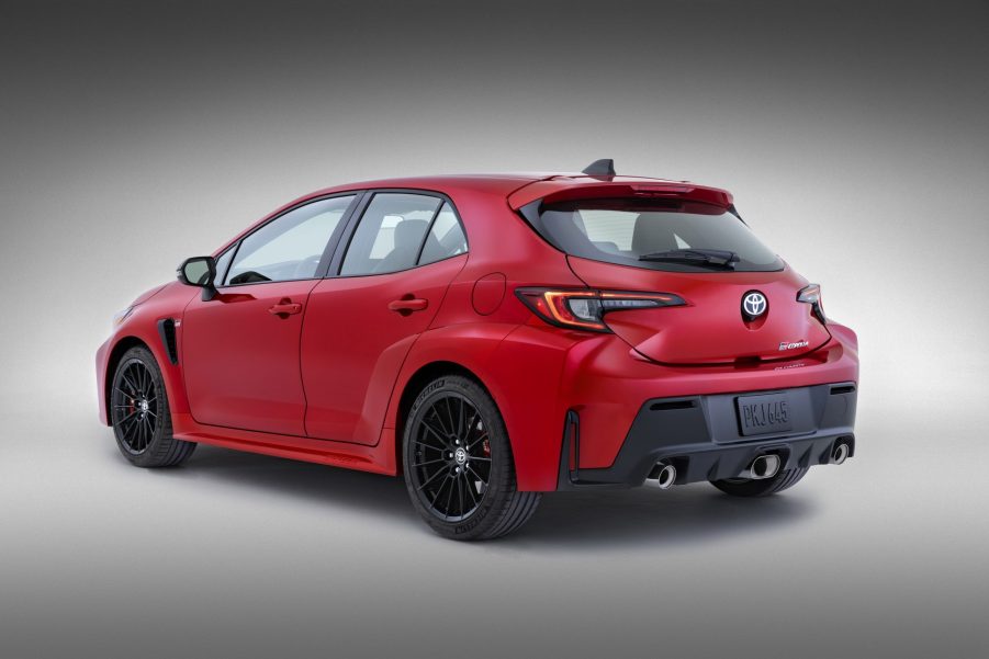 The rear 3/4 view of a red 2023 Toyota GR Corolla Core