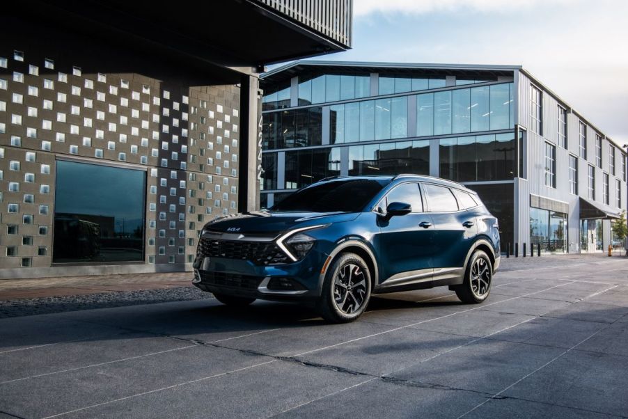 Front angle view of a dark blue 2023 Kia Sportage Hybrid SUV. Pricing was released on April 8