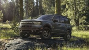 The 2022 Ford Bronco Sport off-roading in the woods