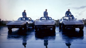 Apollo 12 astronauts with their identical 1969 Corvette Stingray coupes.