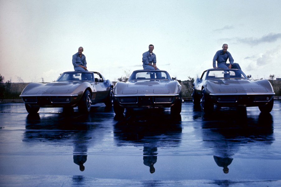 Apollo 12 astronauts with their identical 1969 Corvette Stingray coupes.