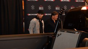 Country star Brantley Gilbert examining the Speedcore Ford F-150 at the Bridgestone Arena Plaza in Nashville, Tennessee