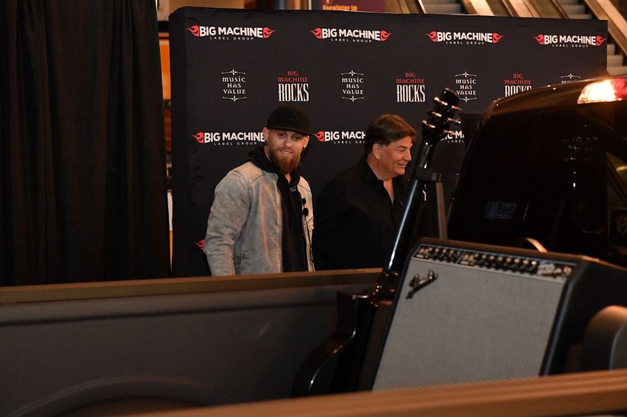 Country star Brantley Gilbert examining the Speedcore Ford F-150 at the Bridgestone Arena Plaza in Nashville, Tennessee