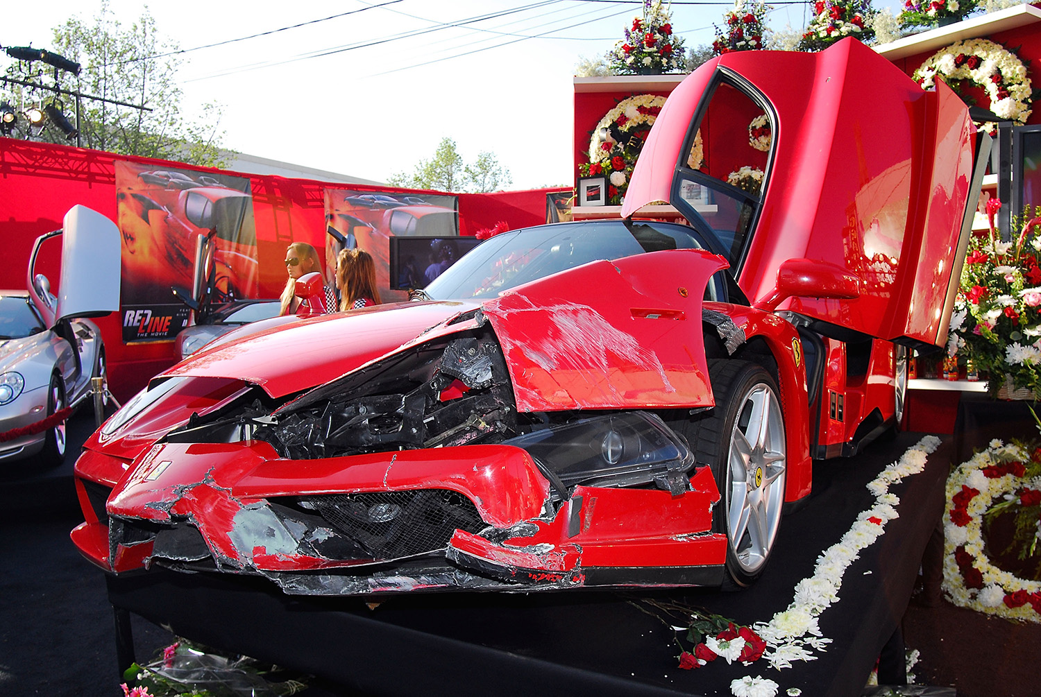 Comedian and Actor Eddie Griffin's crashed 2003 Ferrari Enzo on display at Chinese Theatre