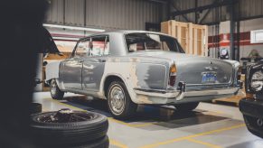 The rear 3/4 view of the first 1965 Bentley T Series undergoing restoration