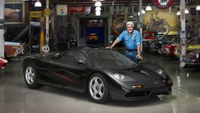 Jay Leno and his 1994 McLaren F1 in a car garage