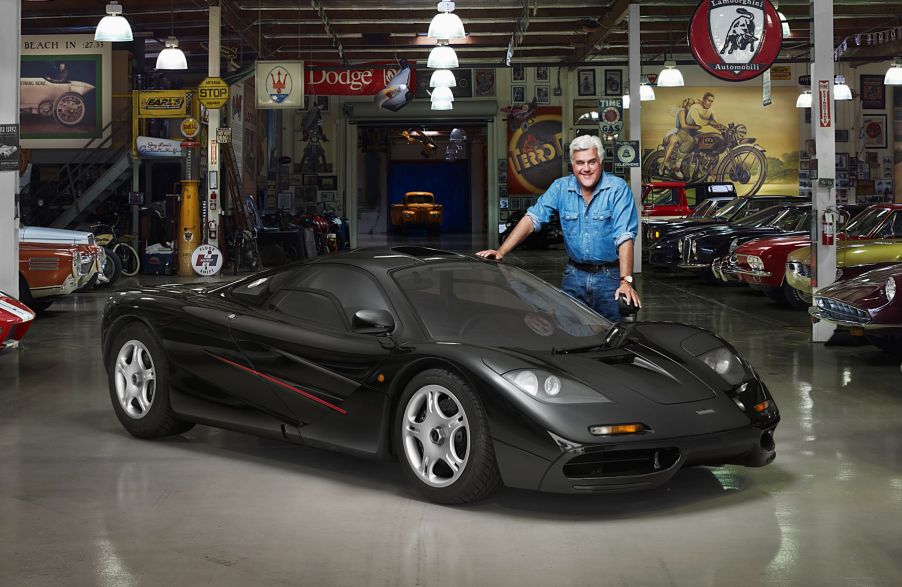 Jay Leno and his 1994 McLaren F1 in a car garage