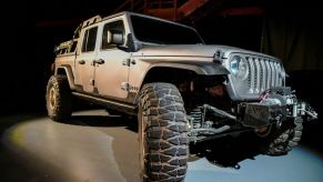 A silver Jeep Gladiator.