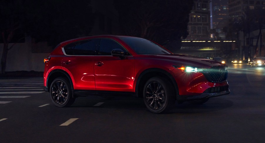 A red 2022 Mazda CX-5 is parked.