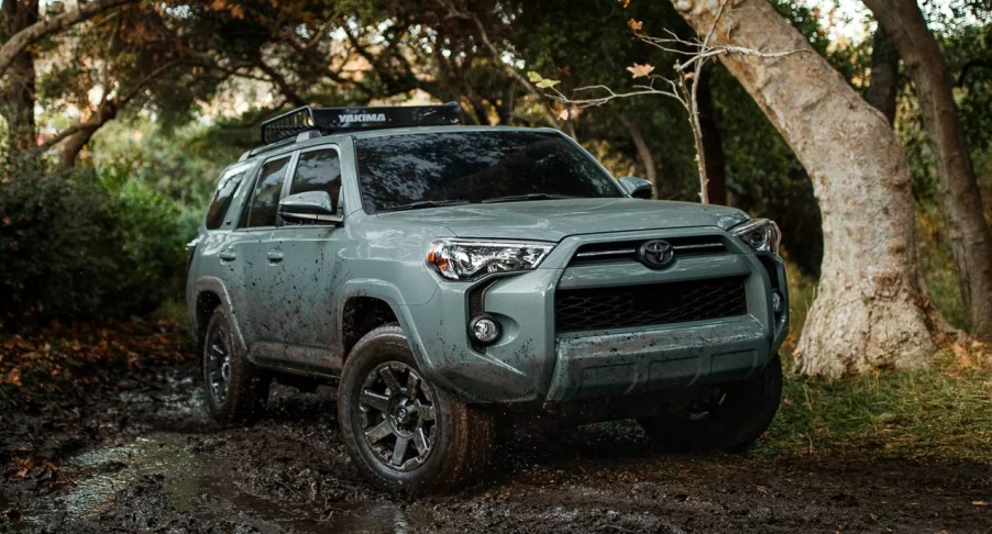 A green Toyota 4Runner midsize SUV is parked outdoors.