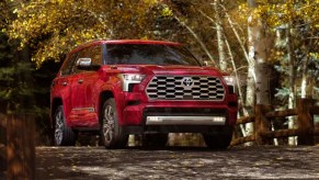 A red 2023 Toyota Sequoia midsize SUV .