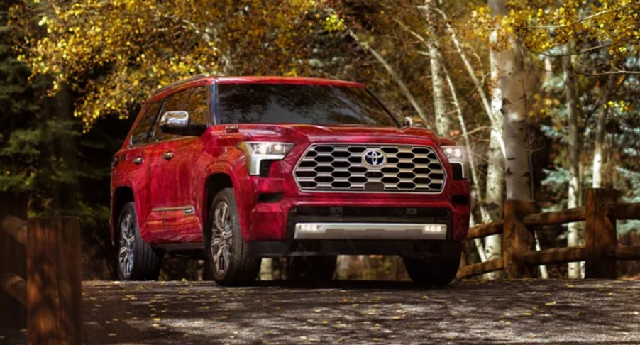 A red 2023 Toyota Sequoia midsize SUV .