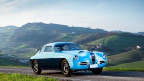 A light blue and black two-tone paint job on a 1955 Alfa Romeo.