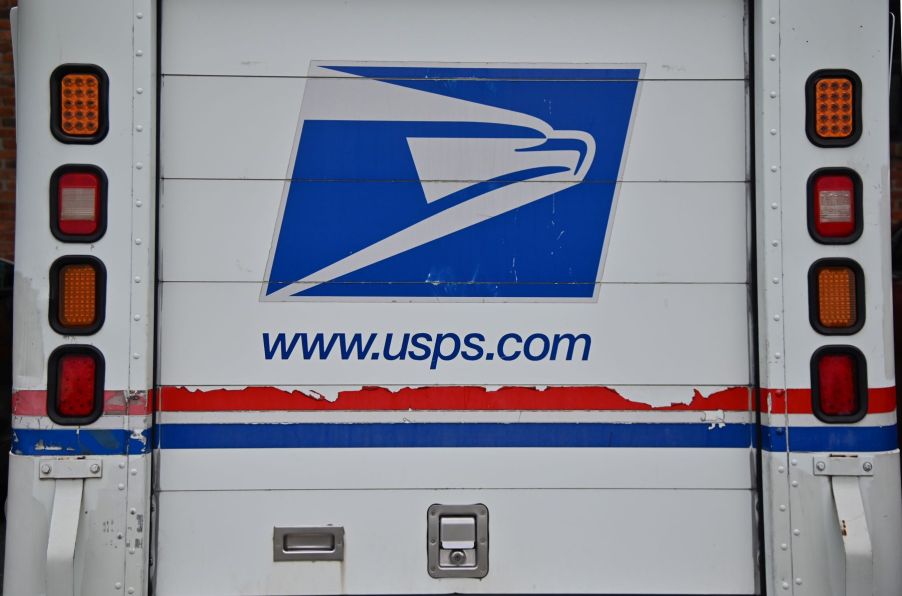 The back sliding door of a USPS (United States Postal Service) postal truck