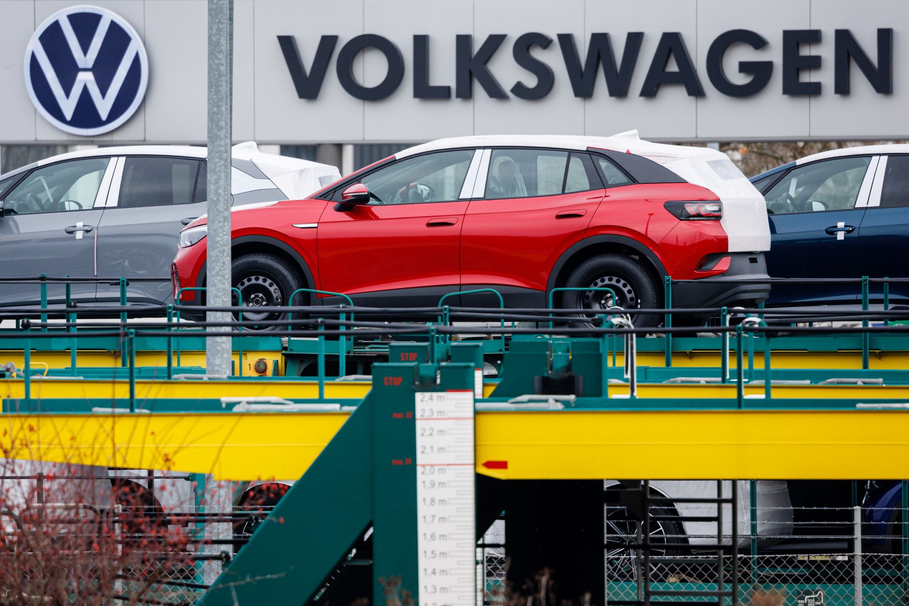 Volkswagen ID.5 electric vehicles parked outside a VW plant in Zwickau, Germany