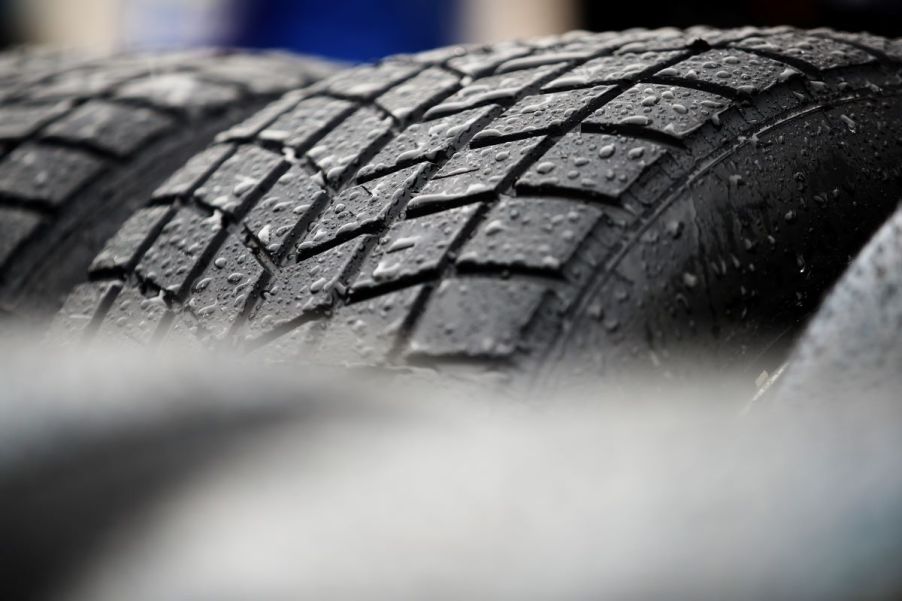 A close-up of a tire with water on it