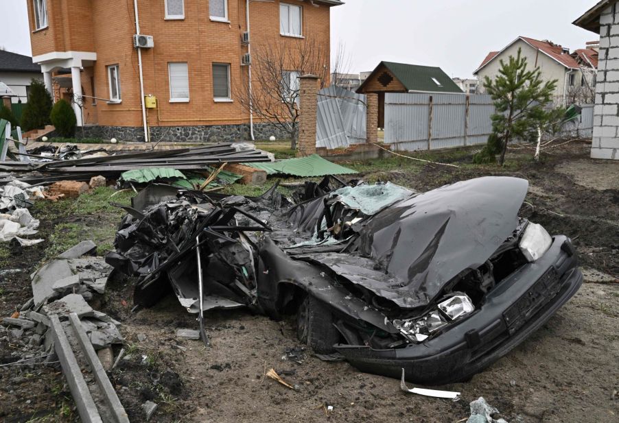 A car crushed by a Russian military tank in the Dmytrivka village of Kyiv, Ukraine