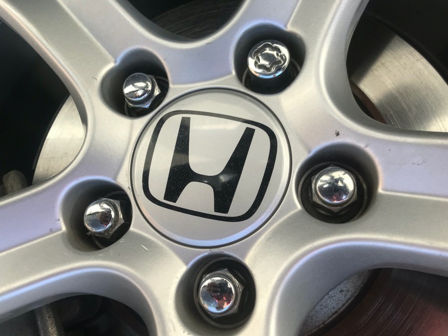 An OEM Honda wheel lock shown on a Honda wheel