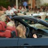 Two teen drivers cruise around in a car.