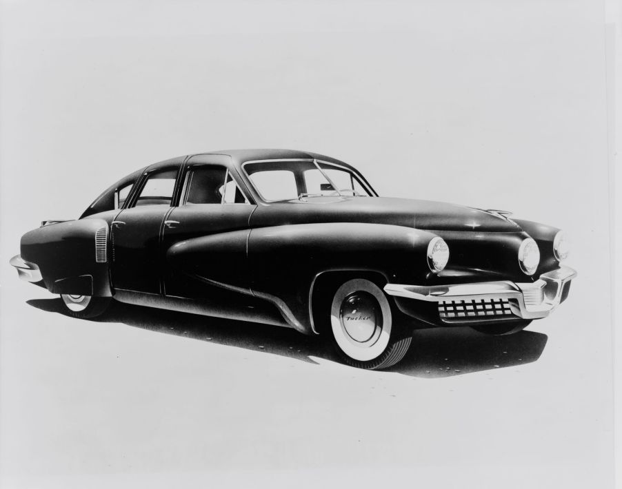 A black and white picture of a 1948 Tucker Torpedo.