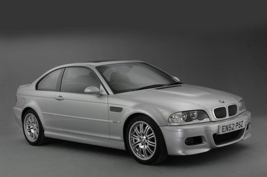 A silver 2002 BMW E46 M3 Coupe in a gray studio