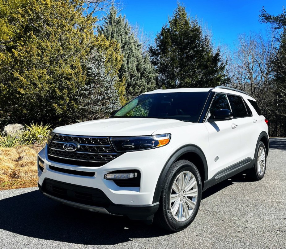 2021 Ford Explorer parked near foliage 