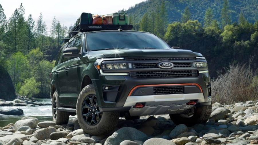 Ford Expedition Timberline SUV on rocks near a lake