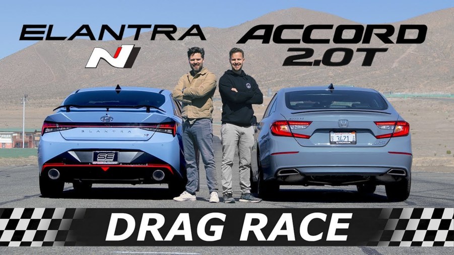 A light-blue 2022 Hyundai Elantra N next to a gray 2022 Honda Accord Sport 2.0T on a desert dragstrip