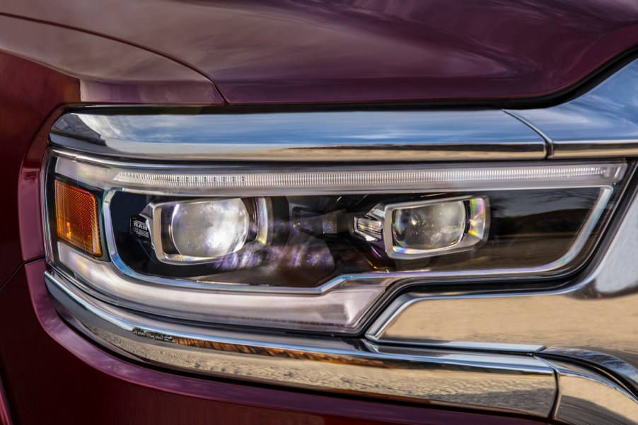 Closeup of the headlight of a 2022 Ram 1500 pickup truck.