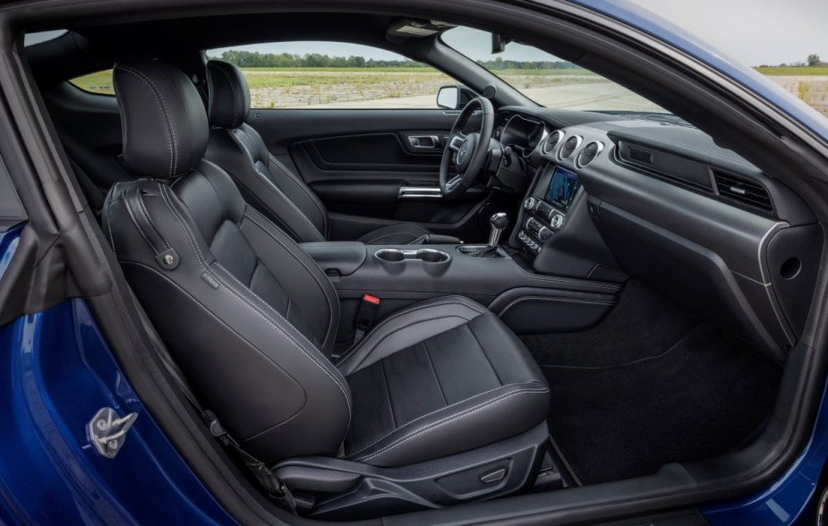 Black interior of the 2022 Ford Mustang Stealth Edition. The 2022 Mustang has a better interior than the 2022 Chevrolet Camaro