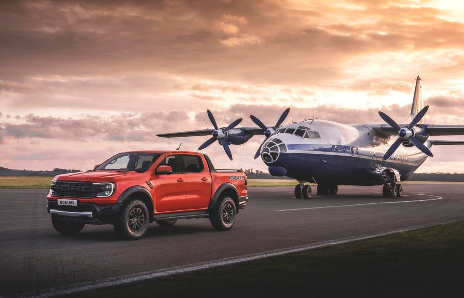 a red 2023 Ford Ranger Raptor on a runway