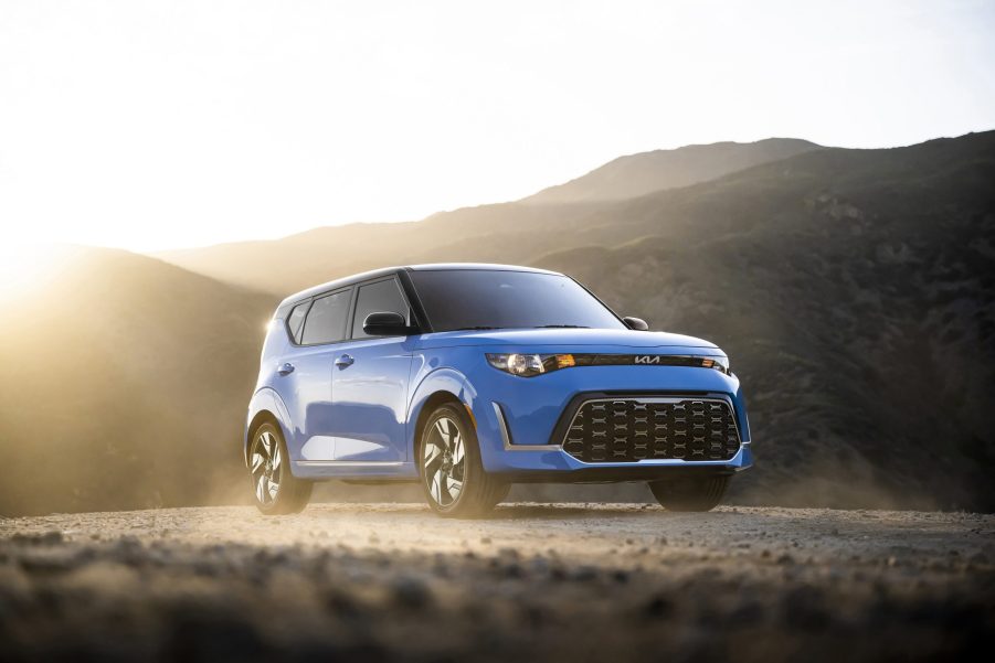 A Surf Blue 2023 Kia Soul GT-Line with a black roof in the desert