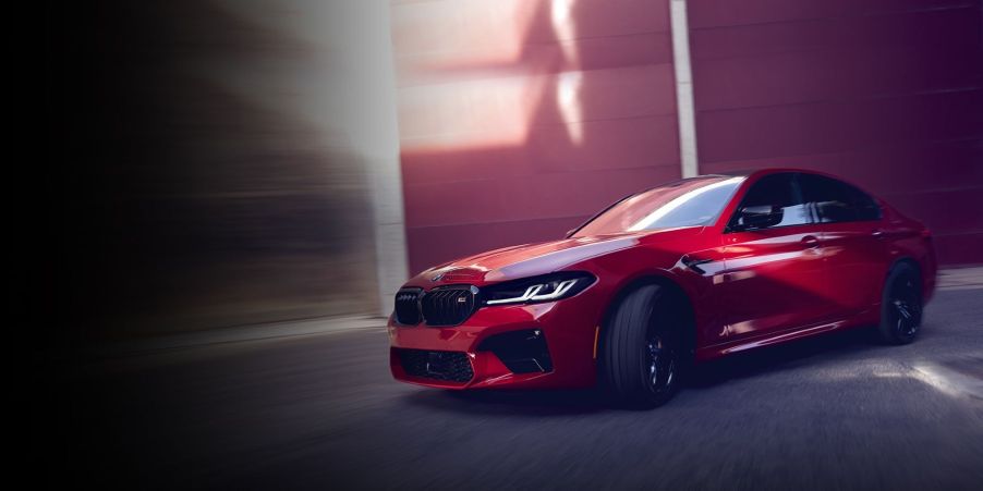 The 2022 BMW M5 sedan in red