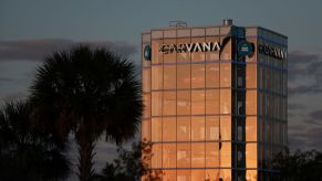 A Carvana building against a dark sky.