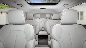 The interior three-row seats of the 2022 Jeep Grand Cherokee L. The interior is lacking but luxurious.