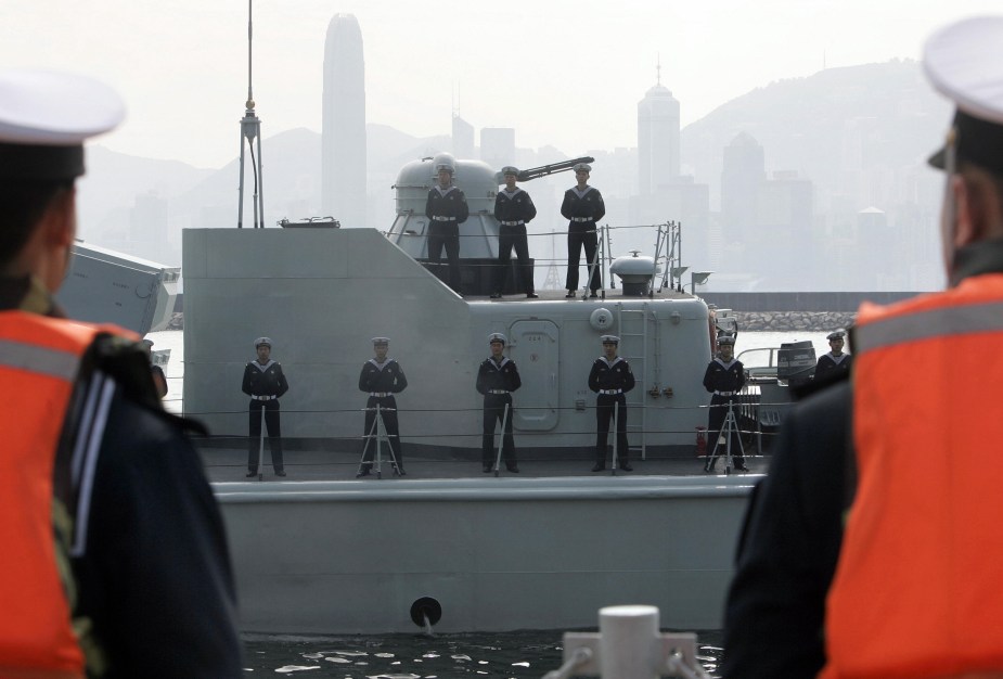 Chinese People's Liberation Army (PLA) standing on a ship