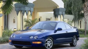 Blue 2001 DC2 Acura Integra GS-R Sport Coupe parked in front of house and palm trees