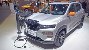 The Dacia Spring Electric charging at the Automobile Barcelona at the Fira de Barcelona Montjuic in Spain