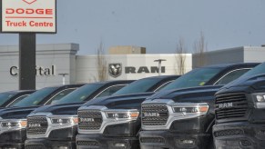 A row of Ram trucks at a Dodge dealership.