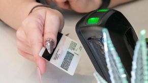 Driver's license being scanned.