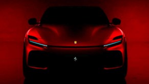 A red Ferrari Purosangue SUV concept.