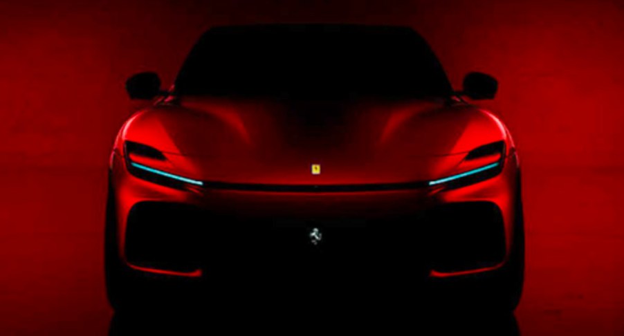 A red Ferrari Purosangue SUV concept.