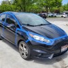 2016 Ford Fiesta ST covered in masking tape in an attempt to test fuel economy hacks for improving mpgs on road trip