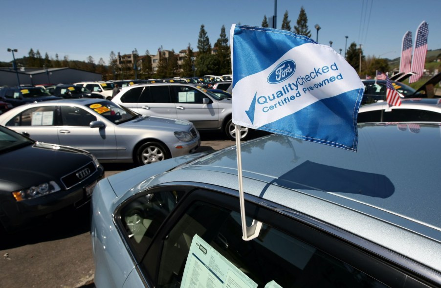 A Ford certified pre-owned car on a sales lot.