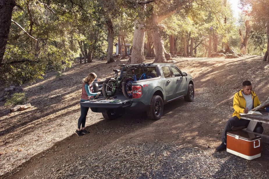 A 2022 Ford Maverick demonstrates its off-road capability as a compact truck.