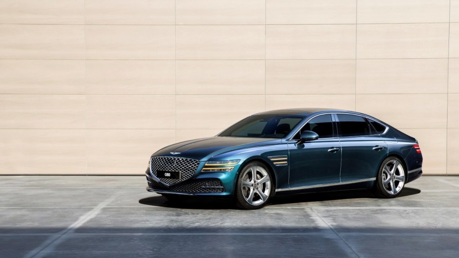 a blue genesis g80, a top safety pick + award winner