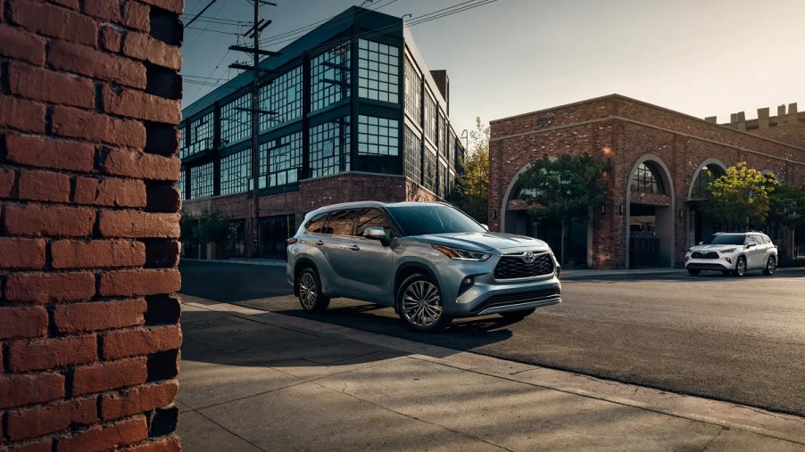 A silver 2021 Mazda CX-9 against the city.