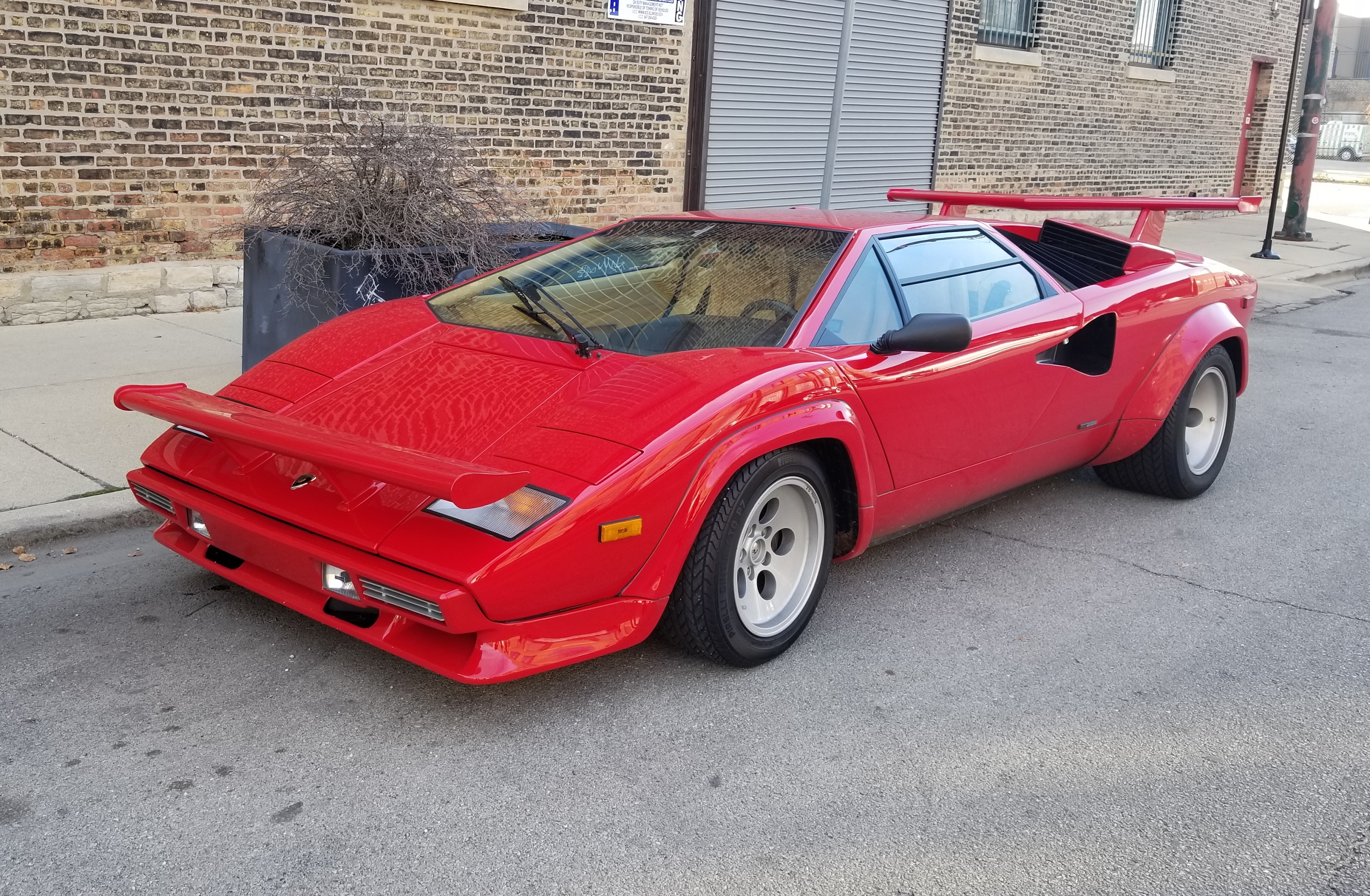 A red Lamborghini Countach LP5000 QV on a Chicago street