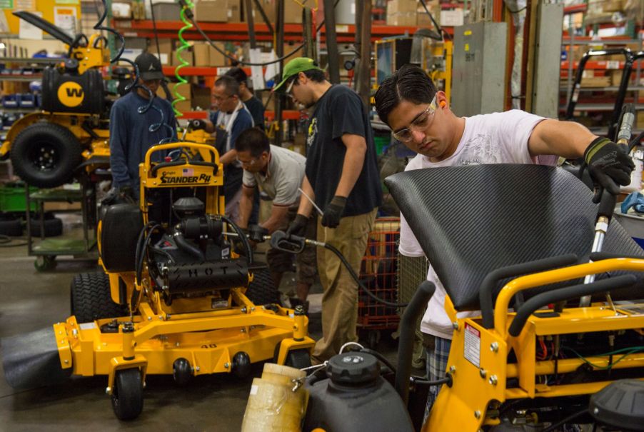 Lawn mowers being maintenance, such as getting the oil changed in your lawn mower.