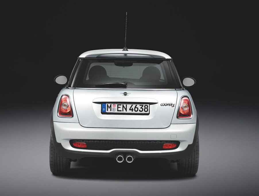 The rear of a white 2009 Mini Cooper S.